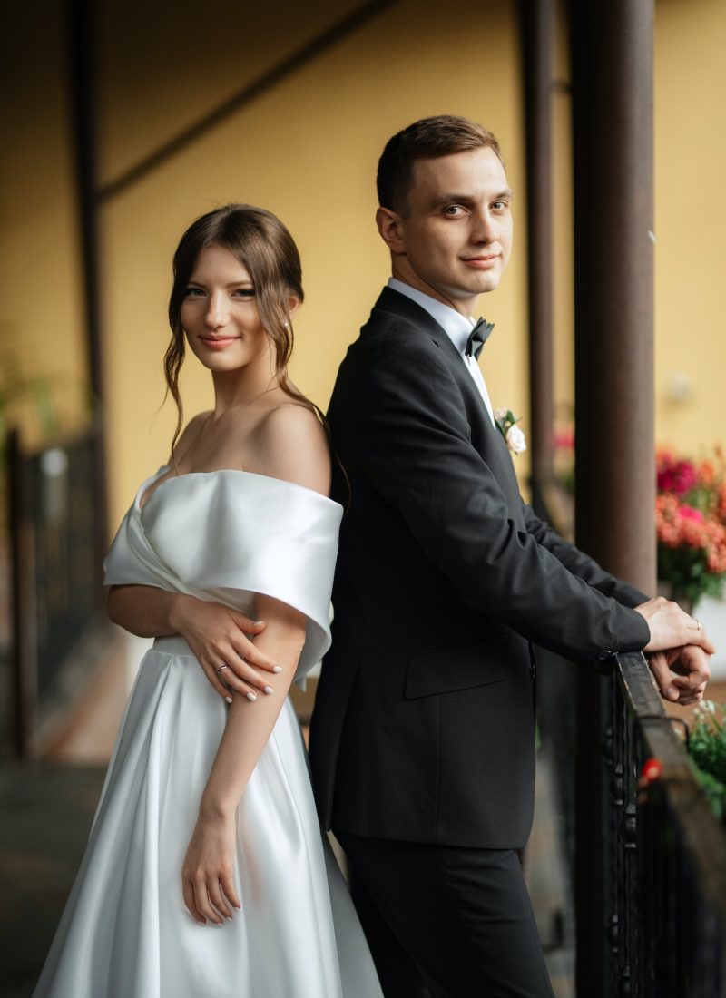 young-couple-bride-and-groom-in-a-white-short-dress-27.jpg